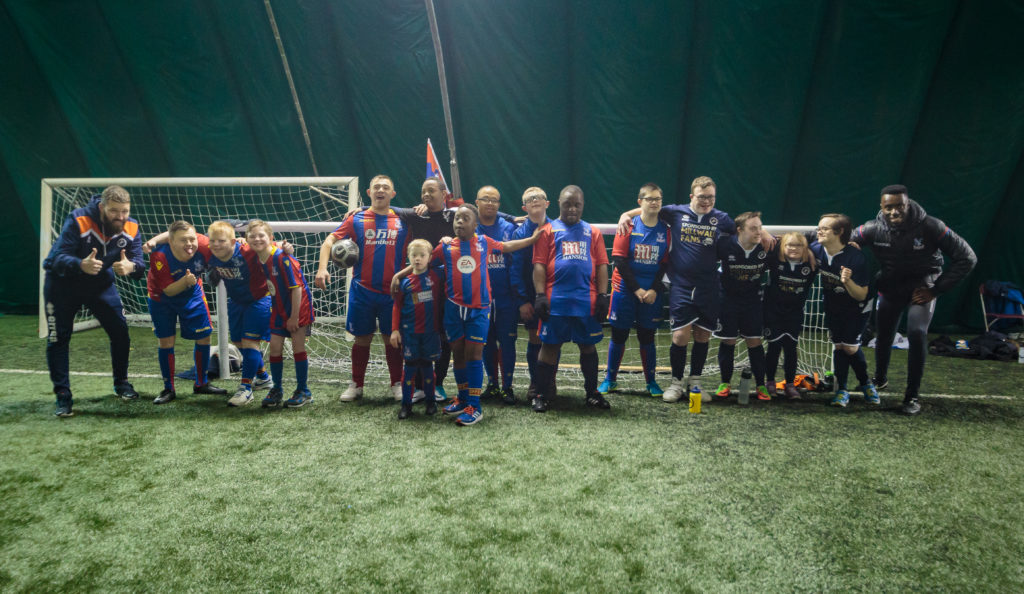 Group shot of players from the DS Eagles and DS Lions